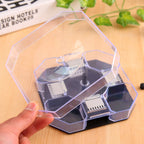 Multiple cockroach traps set up in a kitchen corner to catch pests.