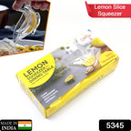 Clear manual fruit juicer effortlessly extracting juice from a lemon.