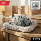 Cute car dashboard cat plush toy with a peaceful closed-eye design