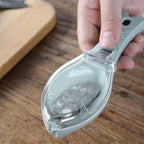 Ergonomic Fish Scale Scraper with a convenient hanging hole for storage.