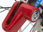 Efficient wheel lock for bike and scooter security, demonstrating compact size.