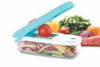 The Ganesh 7-in-1 vegetable dicer showing its sturdy base and blue exterior.