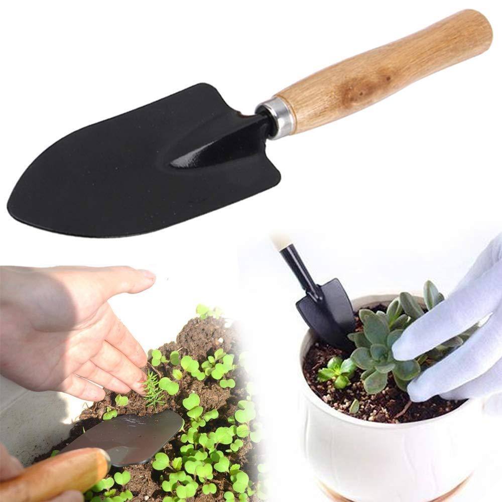 Durable black steel hand digging trowel for garden use.
