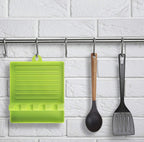 Compact silicone spatula holder and utensil rest for Indian kitchens.
