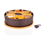 A complete set of the round plastic spice organizer with individual removable cups.