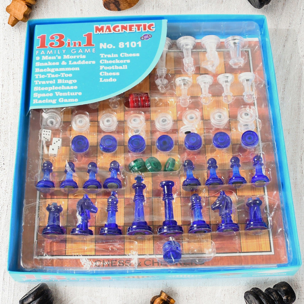 Dollamis 13-in-1 Family Board Game Set displayed with chess pieces and other game boards.