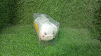 A lifestyle image showing the plastic Pig Shape Ice Mold filled with juice, ready for the freezer.