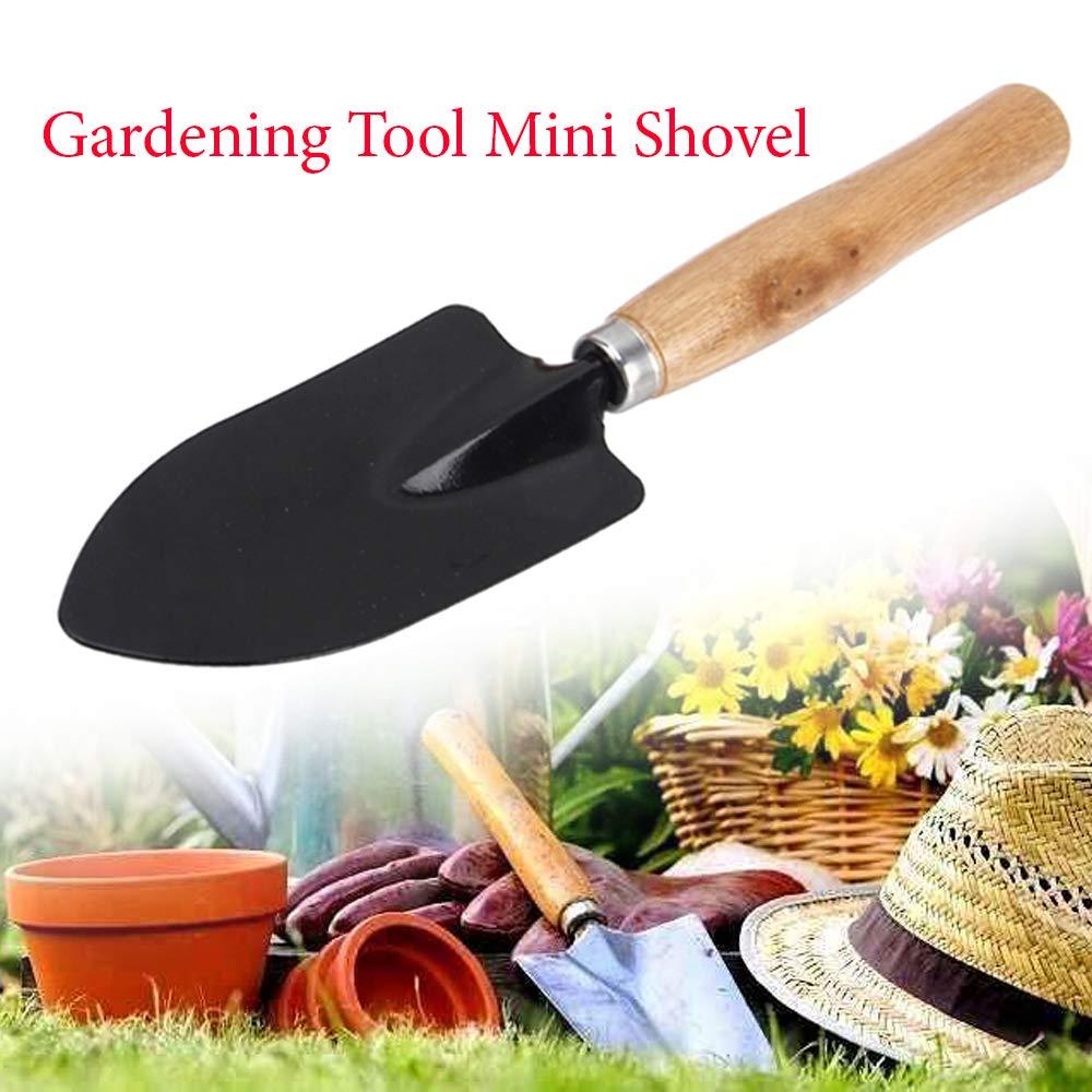 Ergonomic steel hand trowel with a black handle, ready for planting.