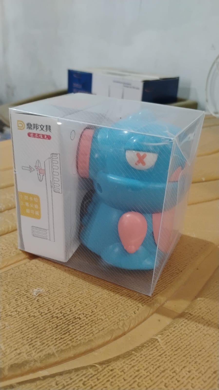 Teddy pencil sharpener packaged in its box, ready for gifting or school use.