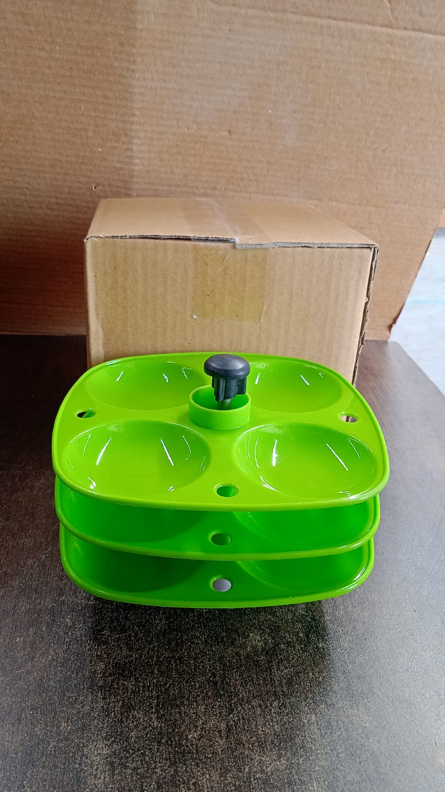 The 3 Layer Idli Stand placed on a modern kitchen counter.
