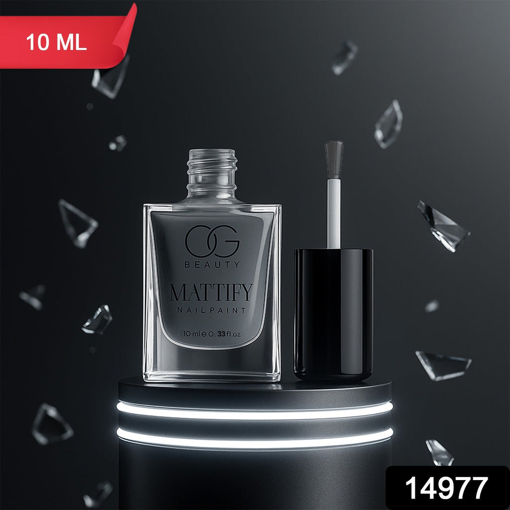 Hand applying Calm Grey Matte Nail Polish for an elegant, modern look.