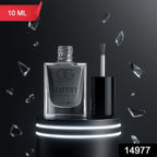 Hand applying Calm Grey Matte Nail Polish for an elegant, modern look.
