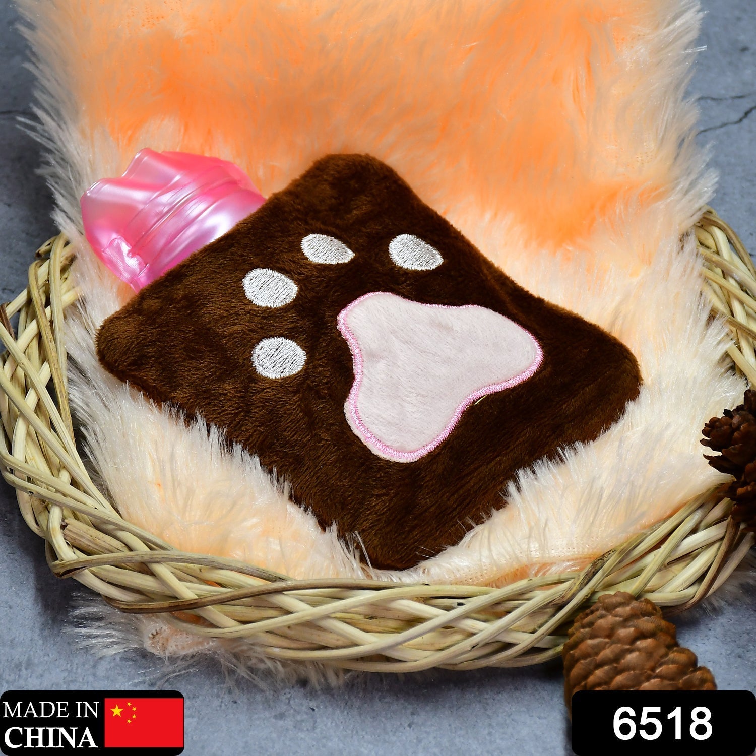 Paw print hot water bag with fabric cover, portable and easy to use.
