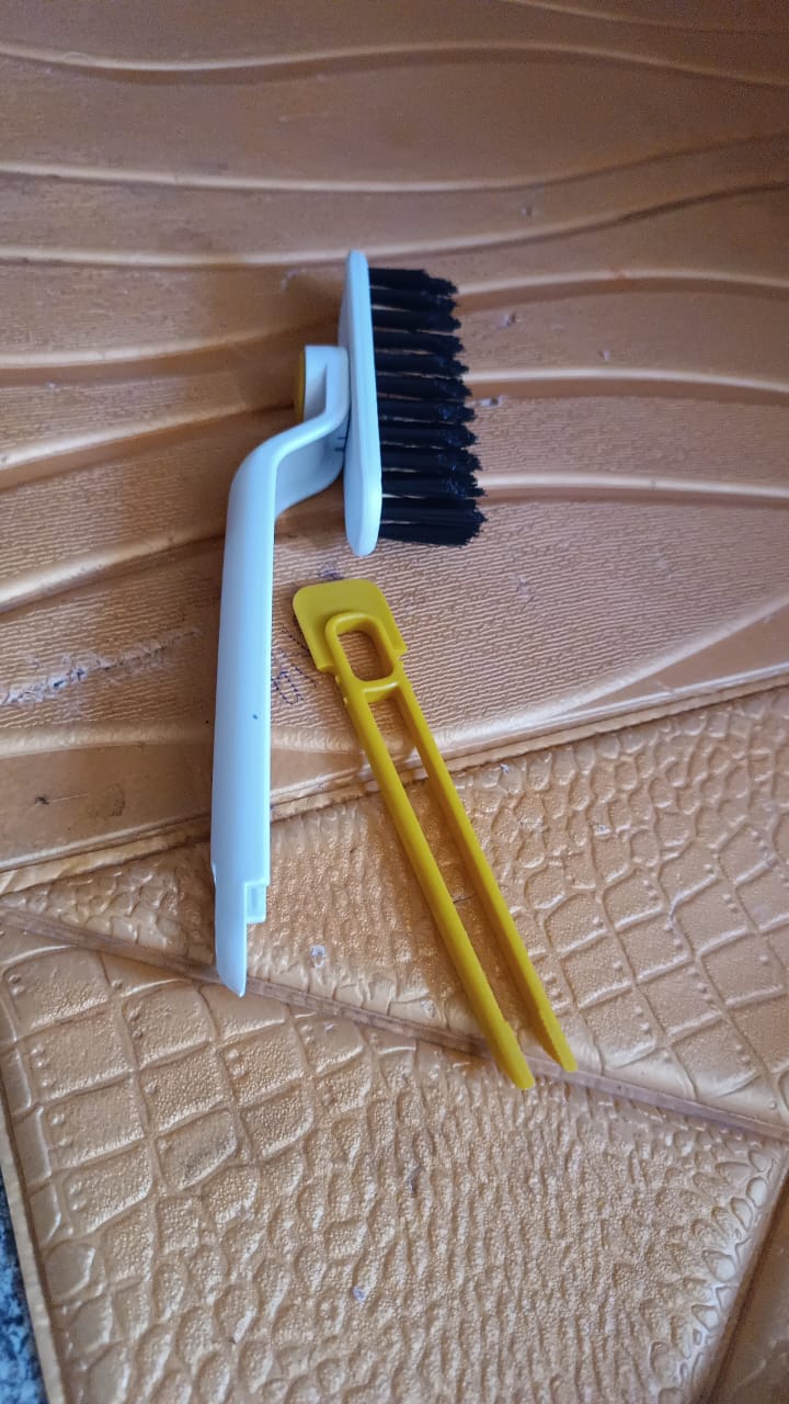 Close-up view of rotating floor scrub brush designed for tough dirt removal