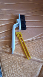 Close-up view of rotating floor scrub brush designed for tough dirt removal