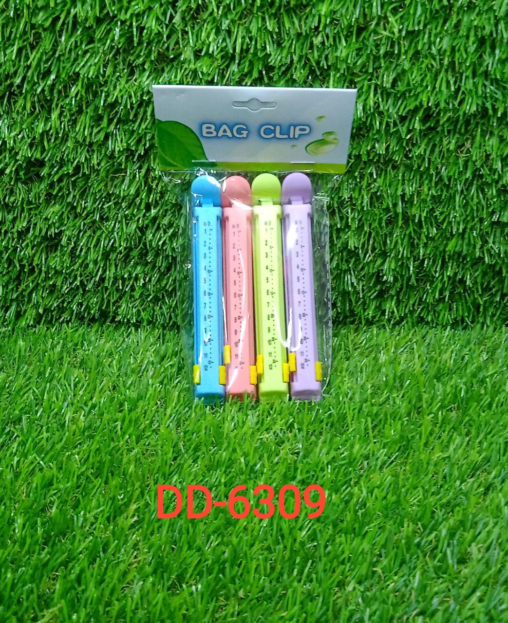 Four food sealing clips in different colours, essential tools for keeping food fresh and secure from contamination.