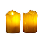 A group of glowing flameless candles providing ambient light in a home setting.