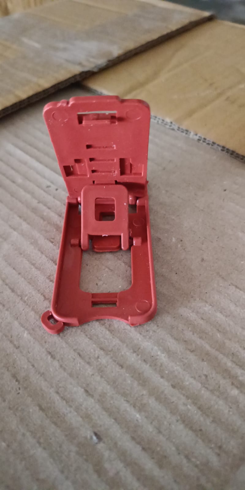 Universal mobile phone stand with foldable portable design by Gambit.