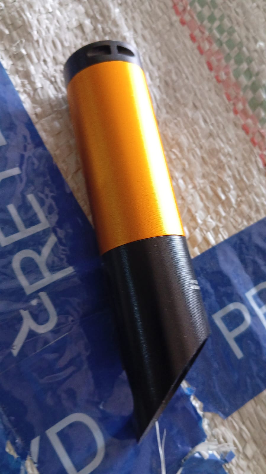 Side view of the 9 LED mini torch, showcasing its ergonomic build.
