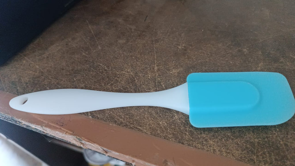 Silicone spatula designed for baking and cooking tasks with non-stick surface