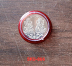 Goddess Lakshmi Pooja Coin placed on cloth background for pooja rituals