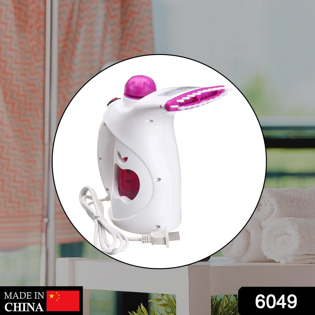 Compact and ergonomic handheld steamer, ideal for both garments and facial spa.
