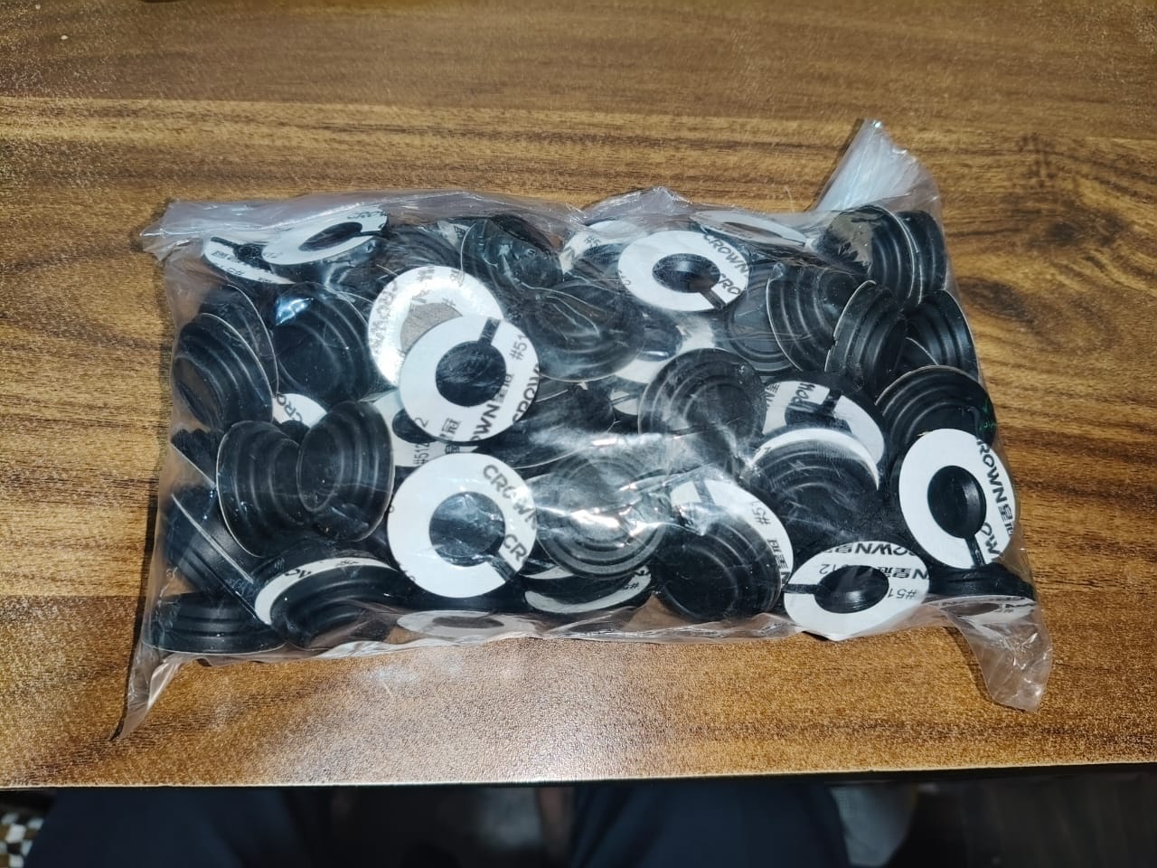 Installation guide for self-adhesive car door shock absorber pads on a vehicle.