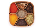 Masala Dabba filled with colorful Indian spices, ready for daily cooking.