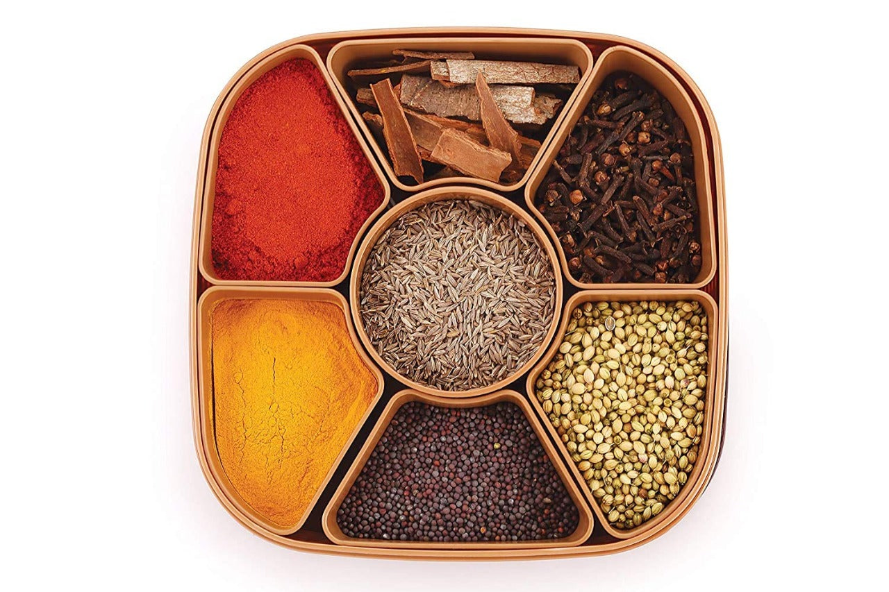 Masala Dabba filled with colorful Indian spices, ready for daily cooking.