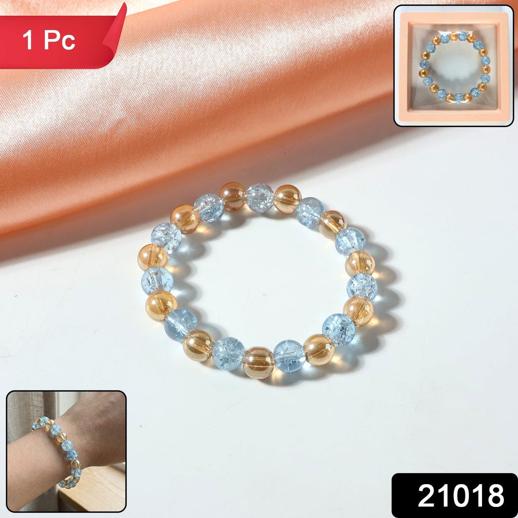 Dual-tone crystal beaded stretch bracelet with glossy transparent beads