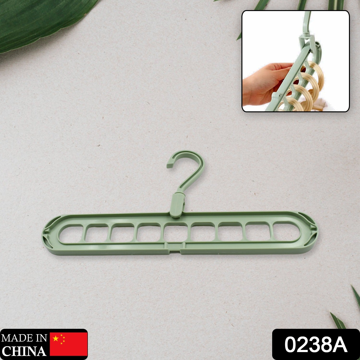 Close-up of the 360° rotatable head of the space-saving multi-hole clothes hanger.