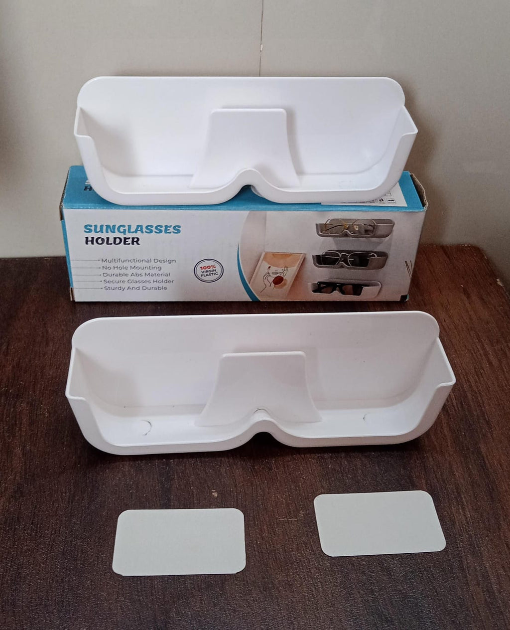 Clear design of the Sunglass Wall Organizer holding glasses, blending seamlessly with decor.