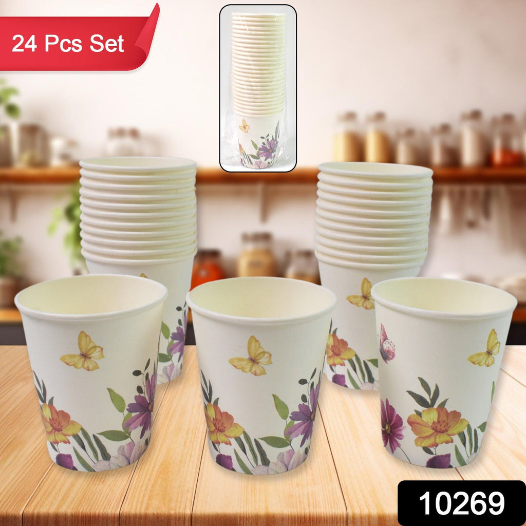 Stack of colourful disposable paper cups with various patterns.