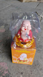 A complete view of the Solar Buddha Car Ornament, ready to adorn your car dashboard.