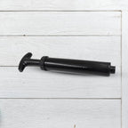 Close-up of the ball pump with both plastic and metal pins.