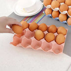 Organivo plastic egg trays neatly stacked, ready for use in a pantry.