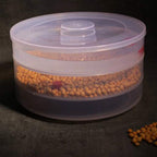 The Tidy Table 3 compartment sprout maker displayed with various sprouted grains for a healthy meal.