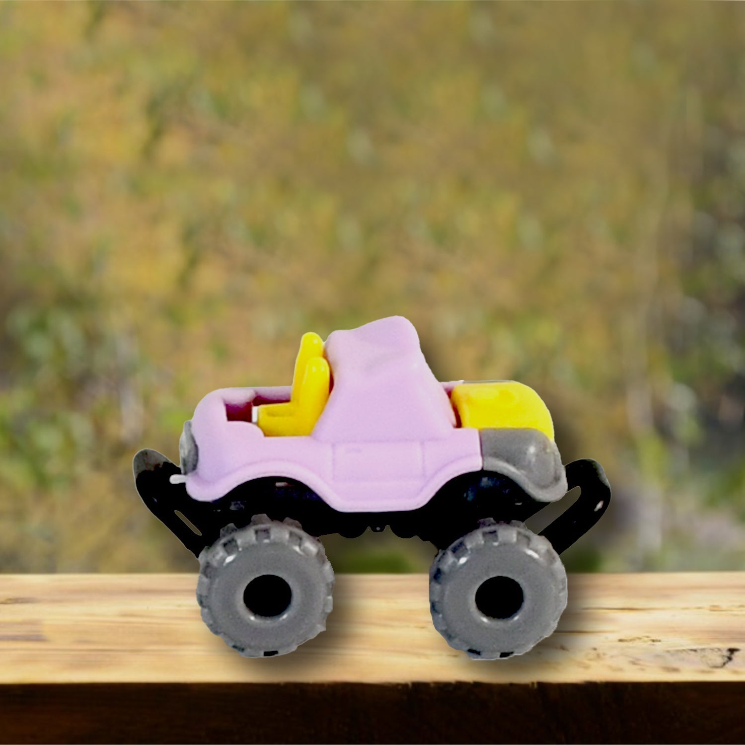 Different coloured friction powered monster trucks arranged to show the variety in the 30 Pcs Set.