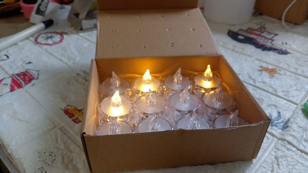 The Flameless LED Tealight Candles box packaging, showing 24 pieces.
