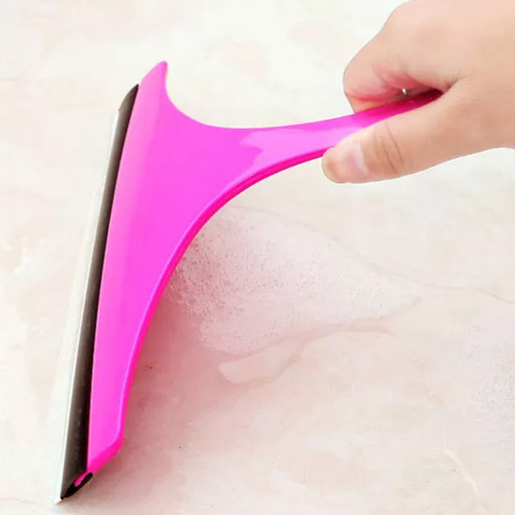 Car mirror wiper effectively clearing a fogged mirror, enhancing driver safety.