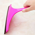 Car mirror wiper effectively clearing a fogged mirror, enhancing driver safety.