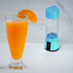 Portable juicer blender with 6 blades, ideal for making fresh fruit juice.