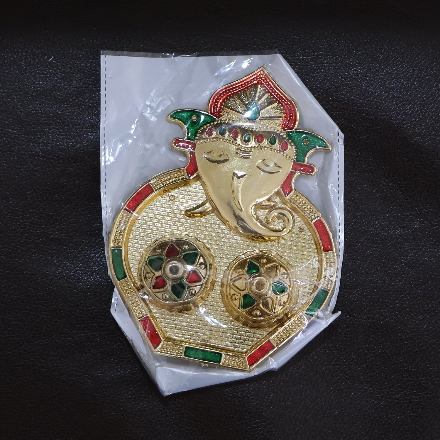 Ganesh Kumkum Box placed on white background showcasing intricate stone work
