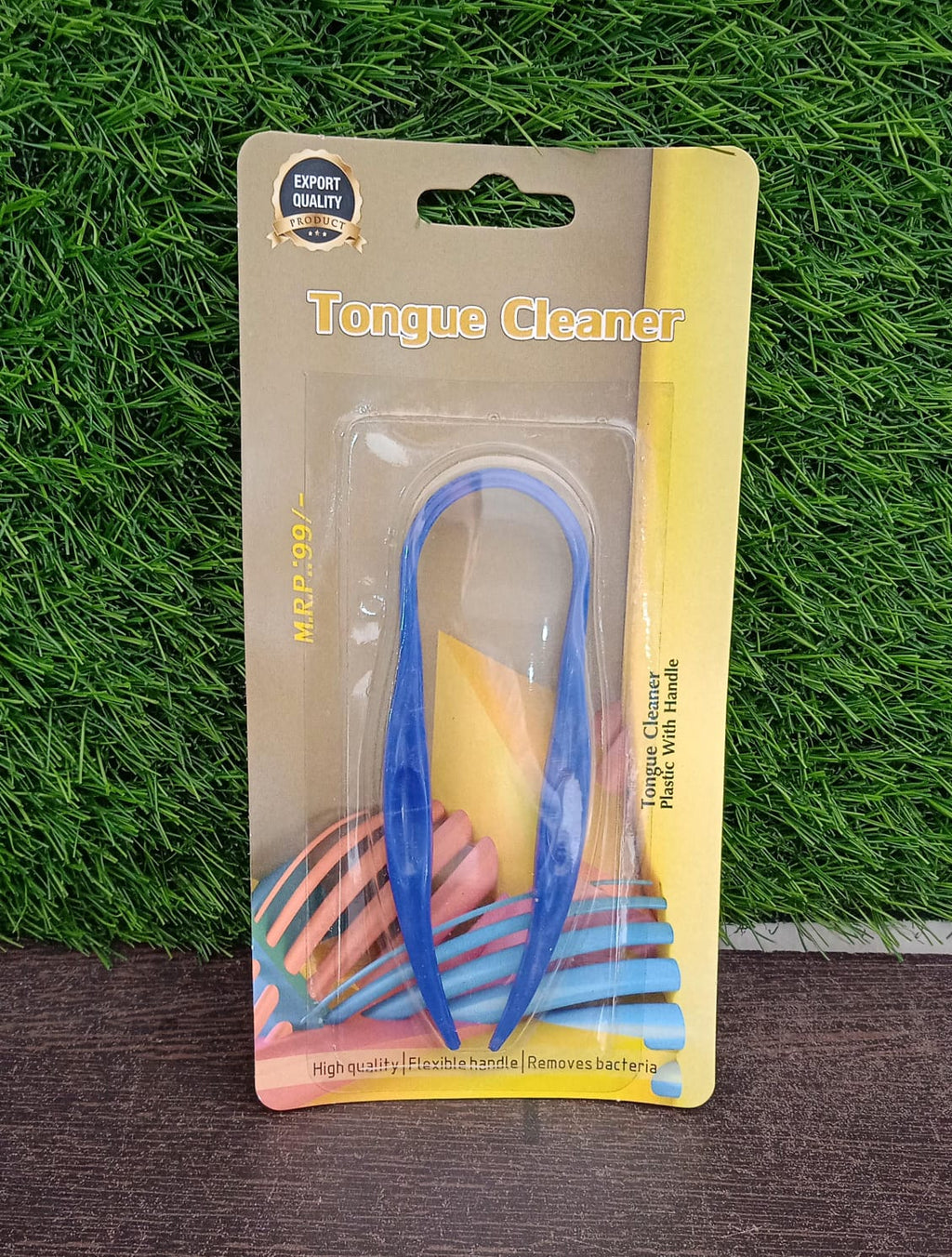 Person using a Plastic Tongue Cleaner for daily oral hygiene routine.