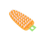 Flexible vegetable scrubbing brush effectively cleaning a potato.