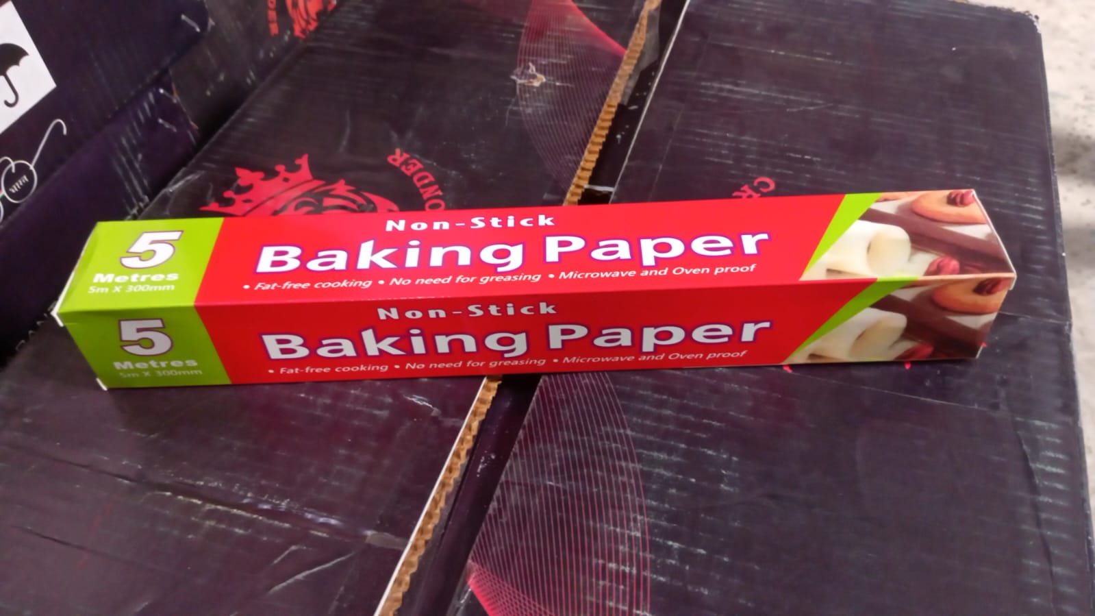 An unrolled sheet of non-stick parchment paper highlighting its length and quality.