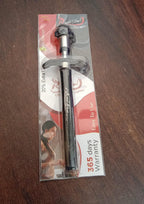 Hand holding the CookAura stainless steel gas lighter, ready to ignite a stove.