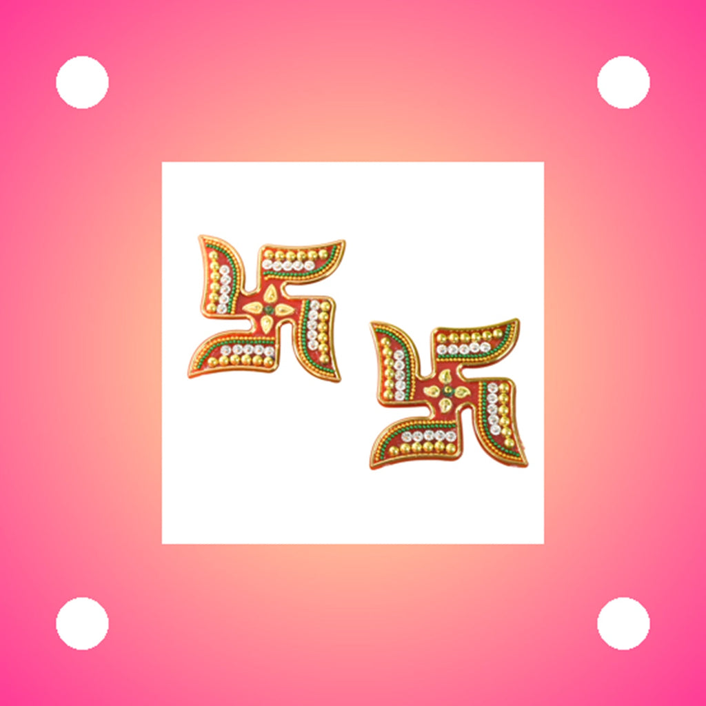 Acrylic Swastik stickers showcasing detailed bead and rhinestone craftsmanship