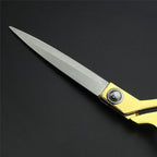 Sharp gold-plated scissors ready for seamless cutting of fabrics and leather.