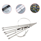 Plain background with a single stainless steel cable tie, highlighting its sleek design.